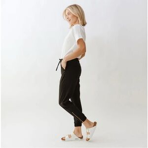 Albion Black Track Joggers with Gold Zipper Detail